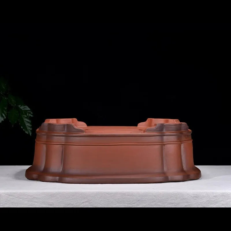 Large antique-style purple clay flowerpot with Chinese design for garden planting
