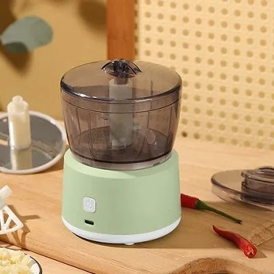 Mini electric meat grinder with transparent cup and stainless steel blade in light green or white