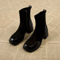Black women's chunky heel martin boots with thick rubber sole and lace-up design