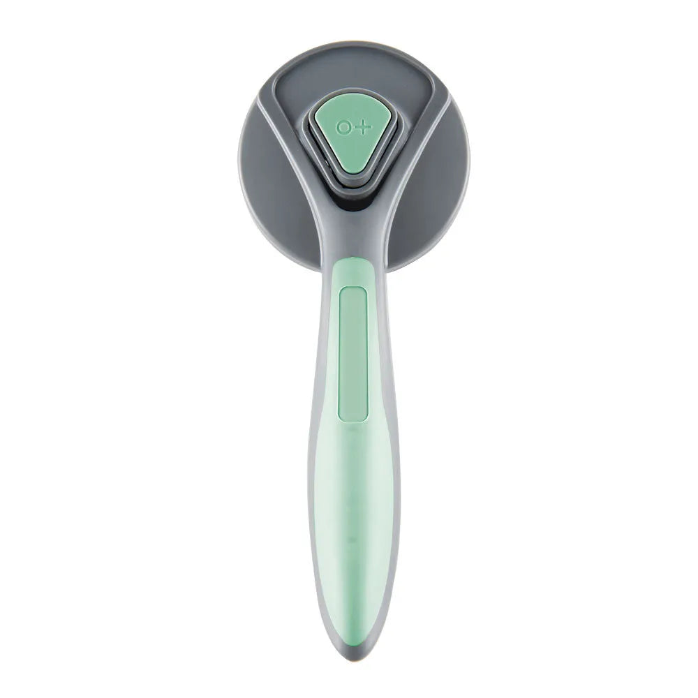 Grey self-cleaning slicker brush for grooming cats and dogs on a wooden table.