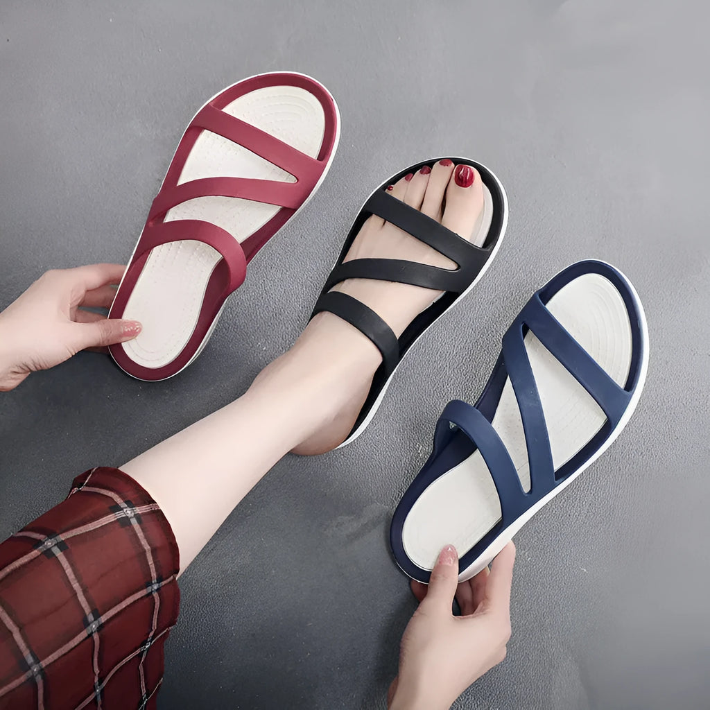 Solid colour women's casual sandals with a breathable design on a summer background.
