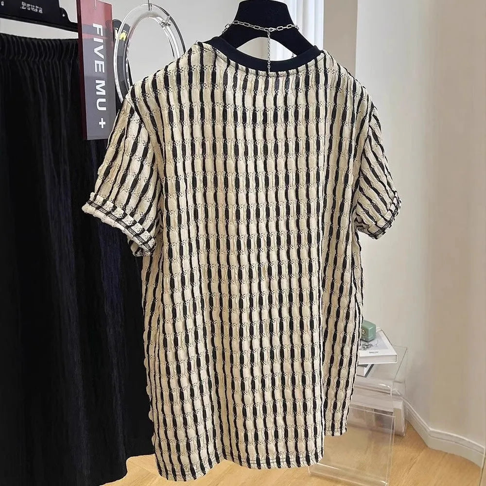 Black striped men's pullover shirt with loose fit and short sleeves made from linen silk blend fabric