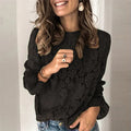 Women's green loose-fit lace shirt with hollow-out detailing and a zip, long sleeves, and a round neck.