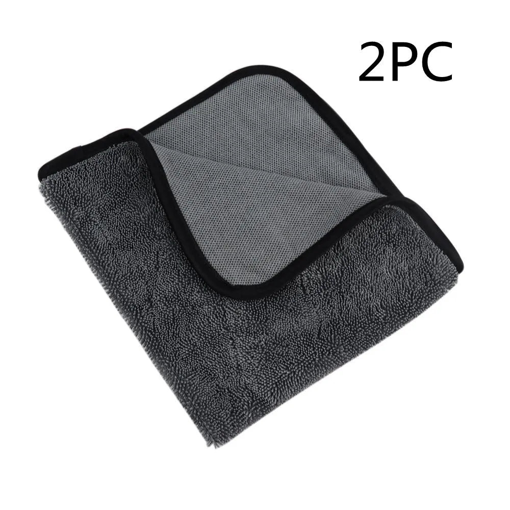 Grey square microfiber car wash towel for drying vehicles.