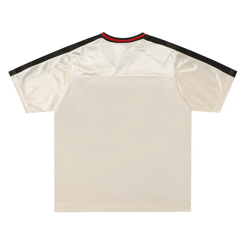 Apricot coloured V-neck sports jersey tops with drop-shoulder sleeves and letter pattern design