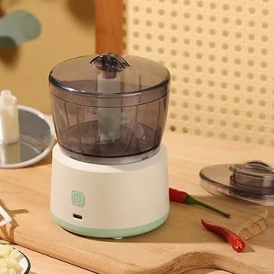 Mini electric meat grinder with transparent cup and stainless steel blade in light green or white