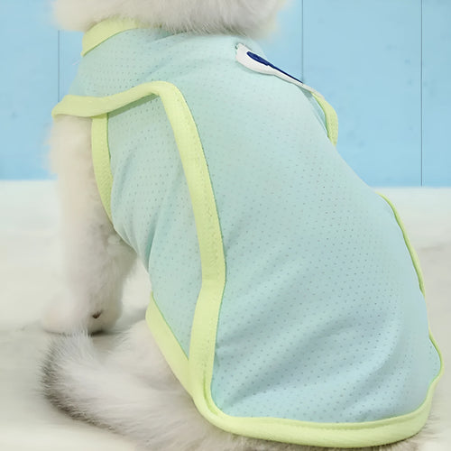 Grass green polyester cat vest for summer wear in size medium on grey background