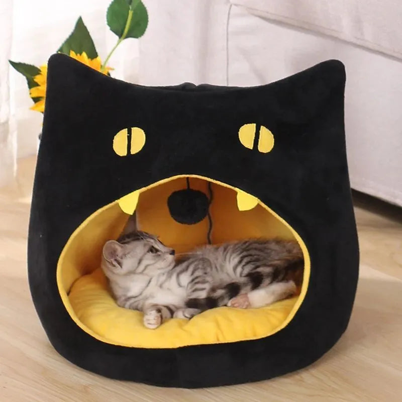 Soft warm cat bed in cat shape design with anti-slip bottom, machine washable, available in S and L sizes.