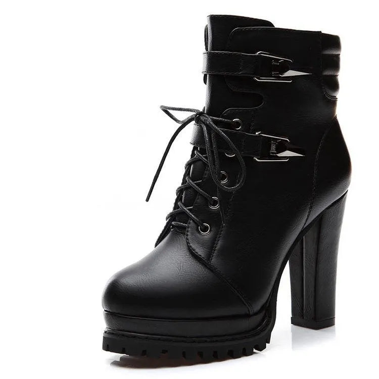 Black round toe thick heel women's high heel shoes with rubber sole on a white background