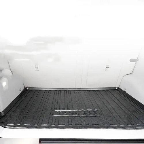 Black carbon fibre pattern TPE trunk liner pad for car boot floor protection.