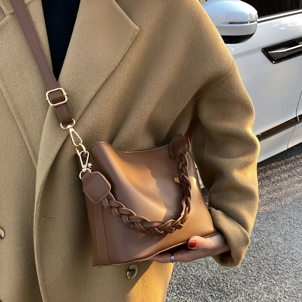 Woven PU one-shoulder crossbody bucket bag in retro style, shown in khaki colour.