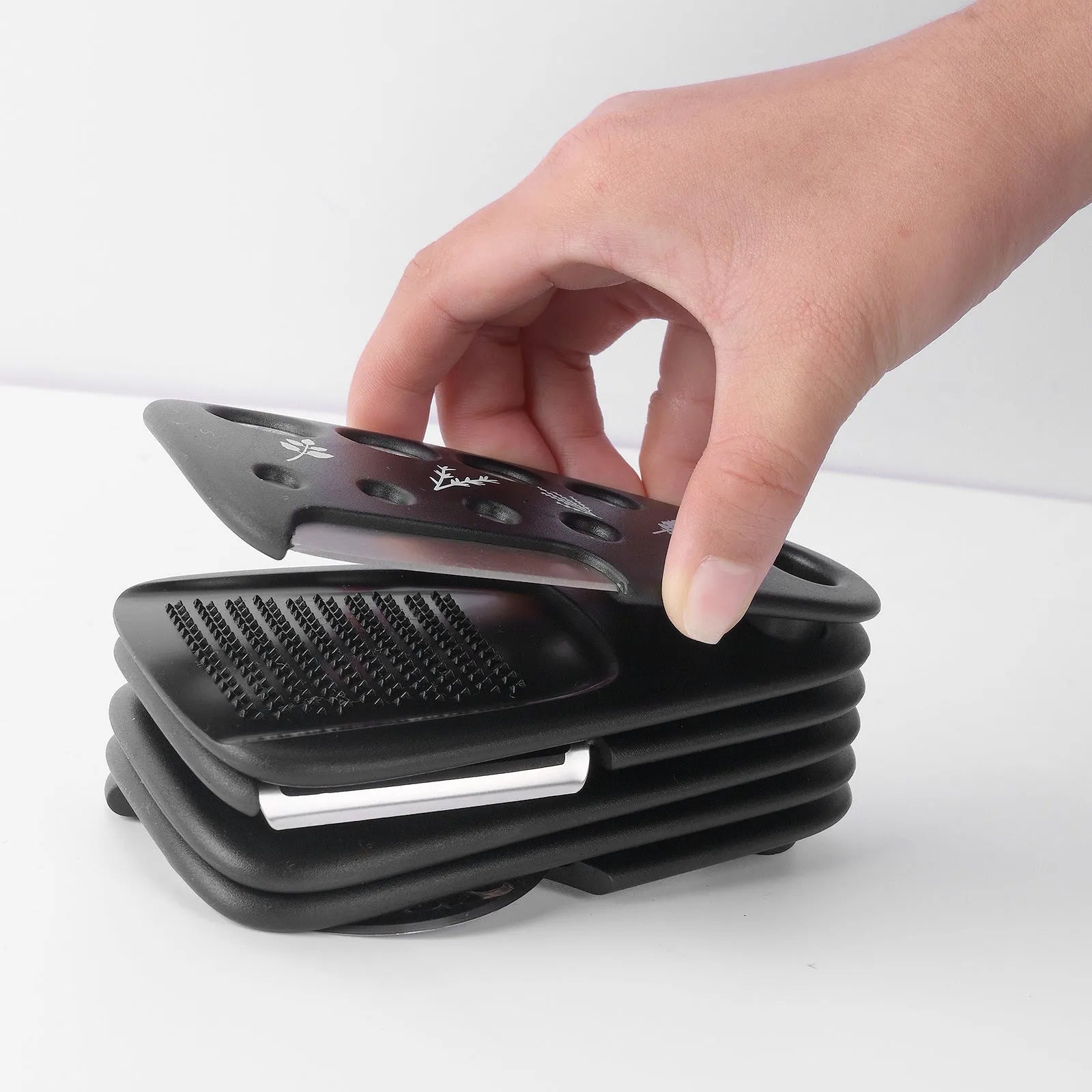 Six kitchen widgets and cleaning brush in modern colour box, made from stainless steel and PP materials