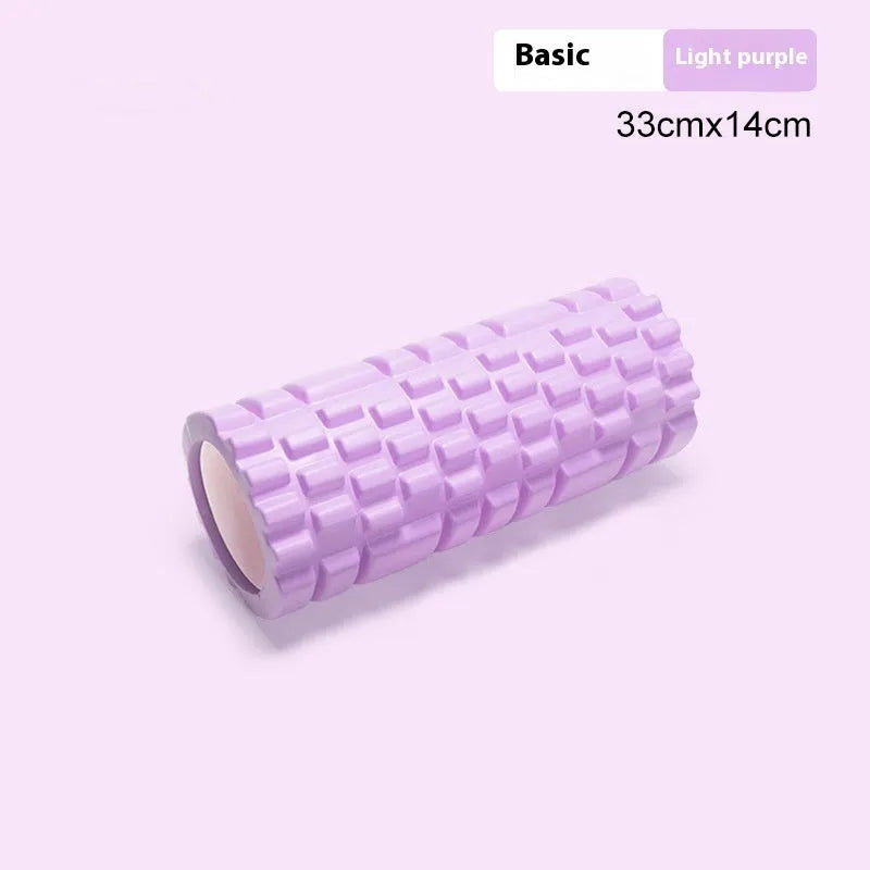 EVA foam roller for fitness in various colours and sizes on a gym floor.