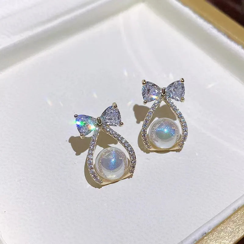 Women's small bow shape earrings in alloy with electroplating, colour as main image