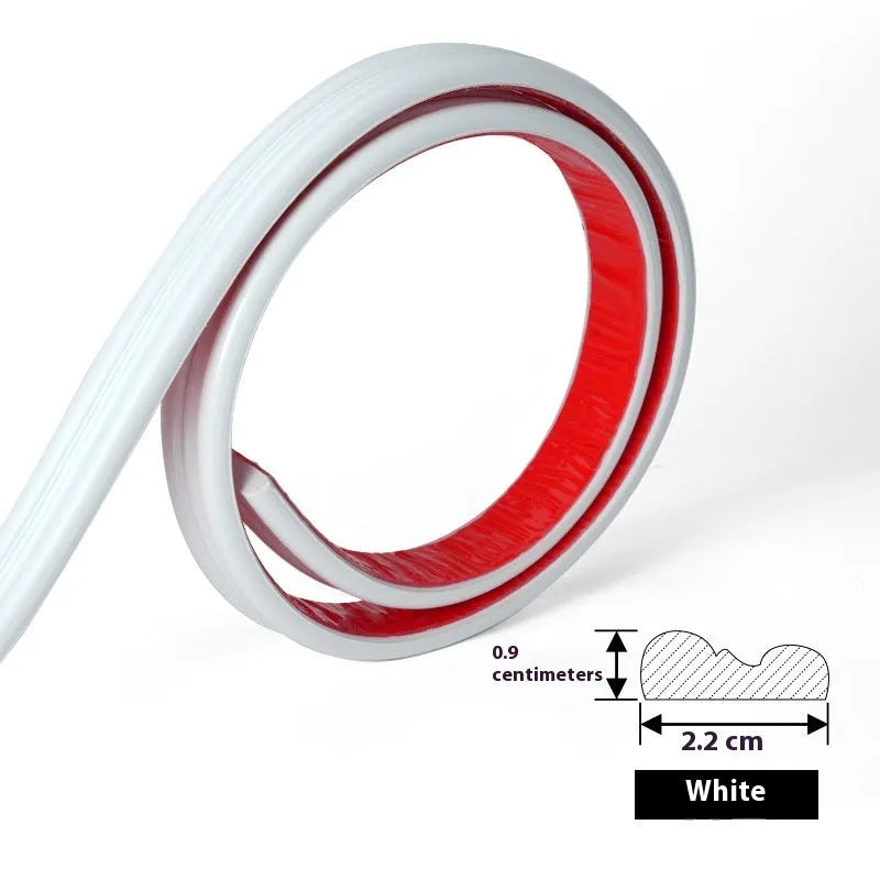 Flexible white PVC self-adhesive wall shaping frame on a blank holder.