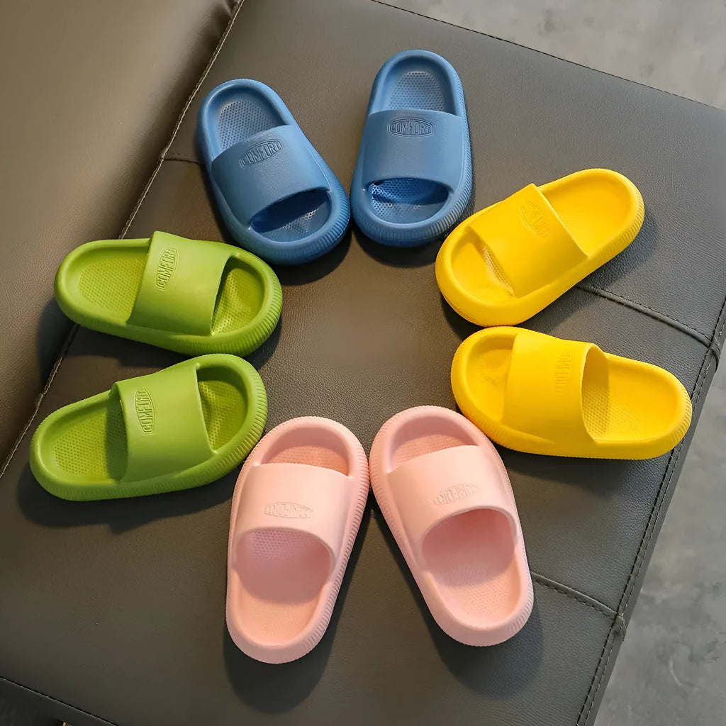 Mixed colour children's EVA slippers with a non-slip sole, shown in sizes for kids.