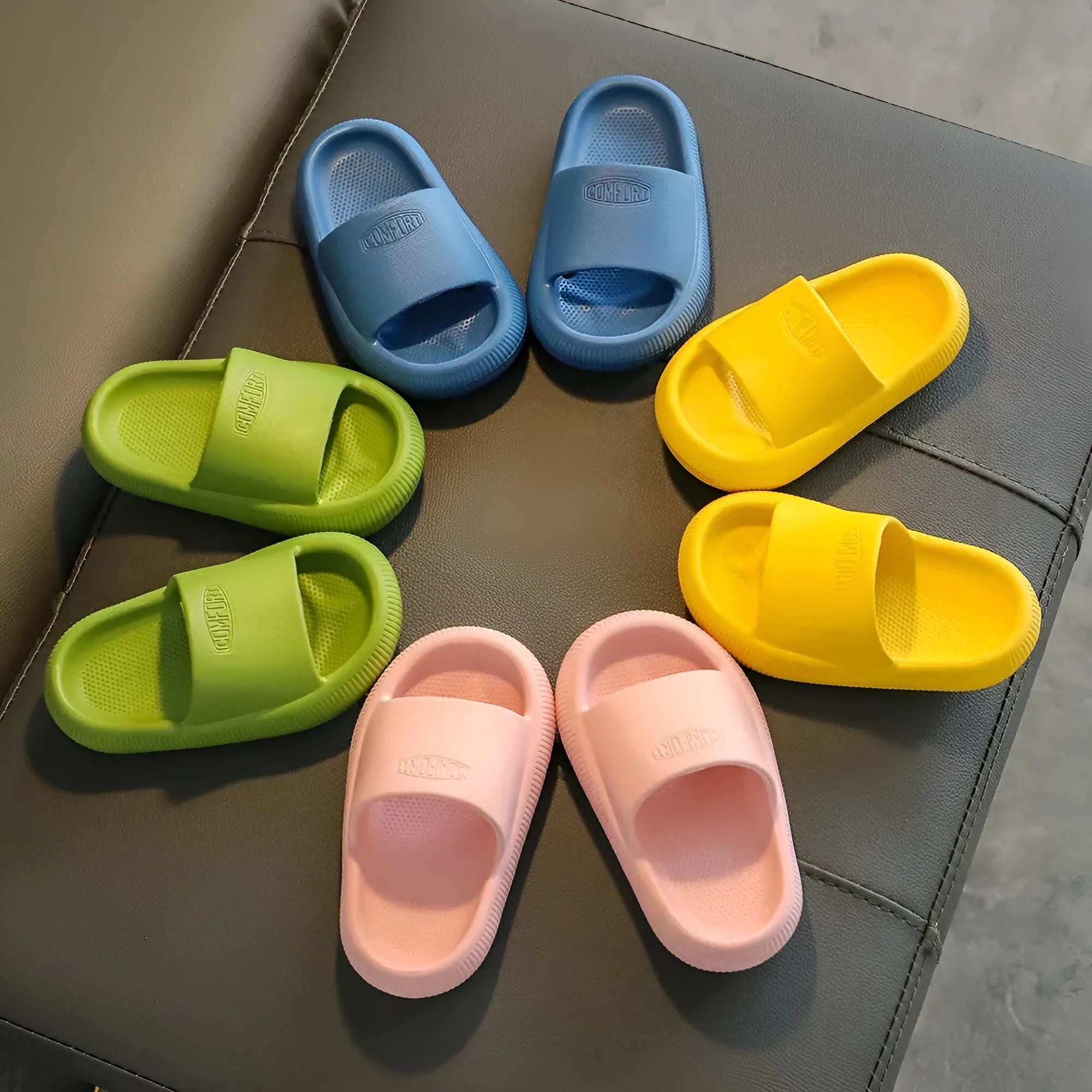 Mixed colour children's EVA slippers with a non-slip sole, shown in sizes for kids.