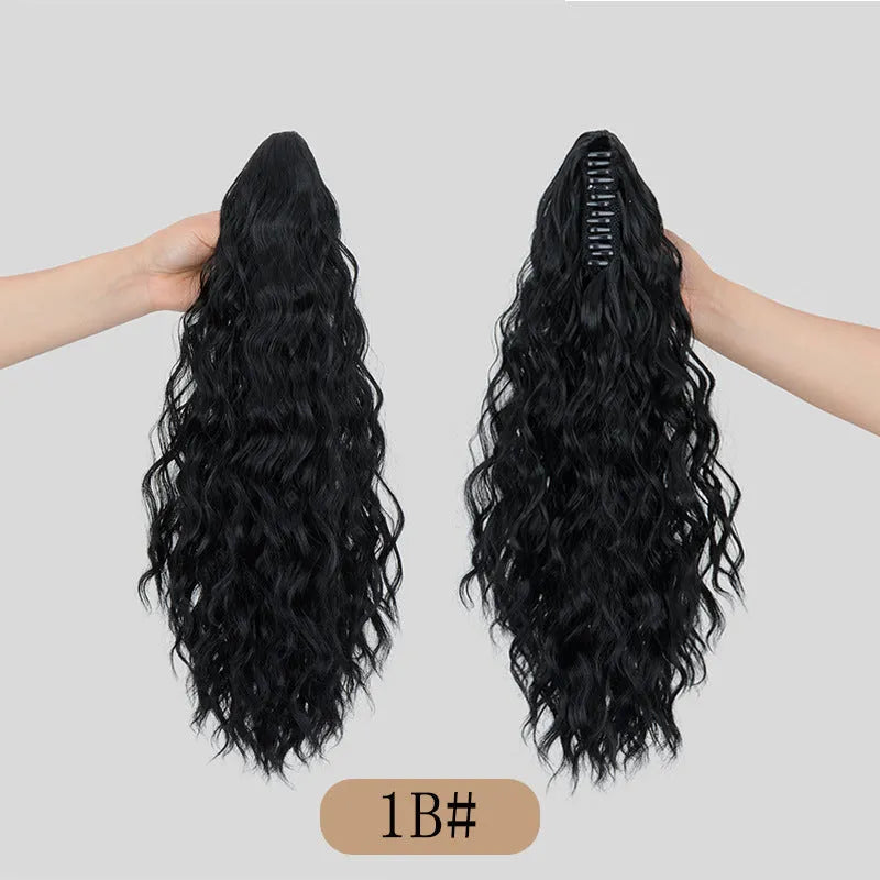 Synthetic corn curler wig ponytail with water ripple grip texture in multiple colour options on a white background.
