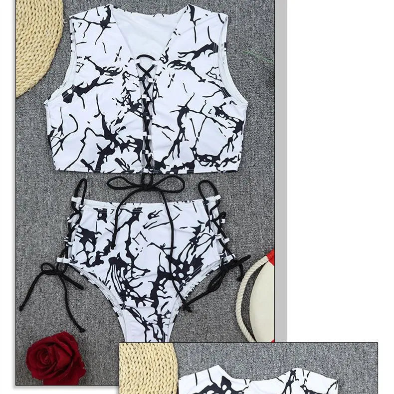 Black and white tie dye two-piece bikini set with chest pad and tied details on the top