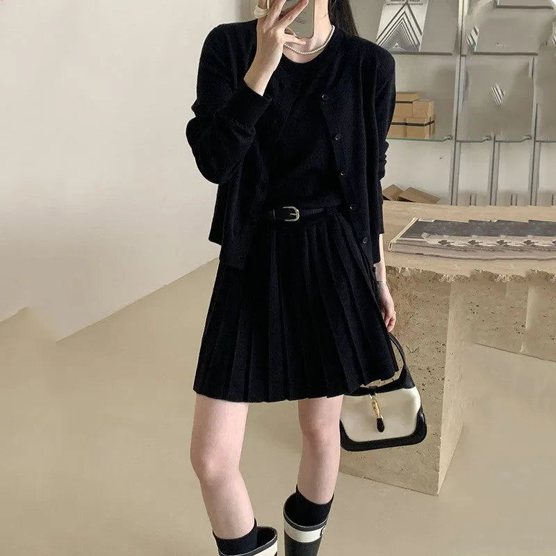 Women's grey art retro knitted vest skirt and cardigan two-piece set with 3D pattern.
