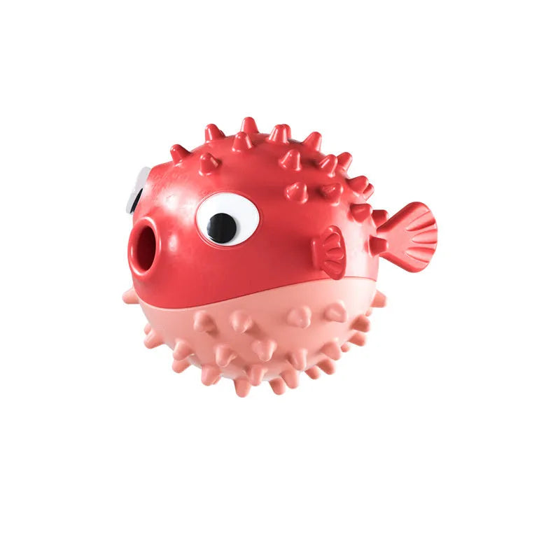 TPR fish-shaped interactive dog chew toy with treat dispensing hole and textured surface