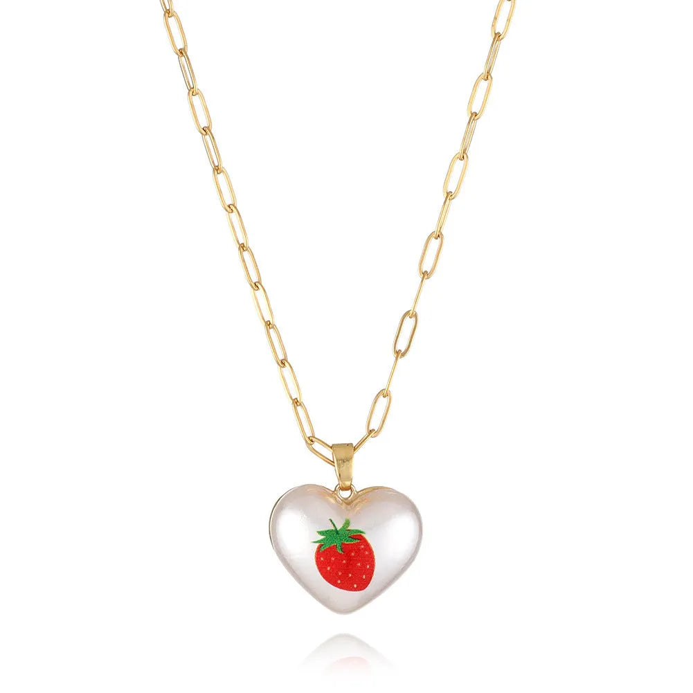 Geometric fruit pendant necklace with adjustable chain showing apple, pineapple, strawberry, cherry and pear designs