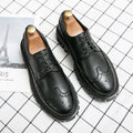 Men's black and brown brogue shoes with round toe and classic business styling