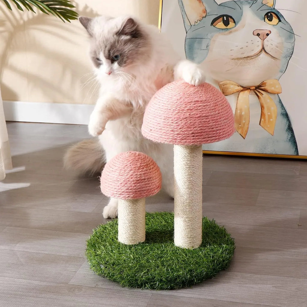 Pink mushroom-shaped cat scratching post with sisal caps and pole for small cats.