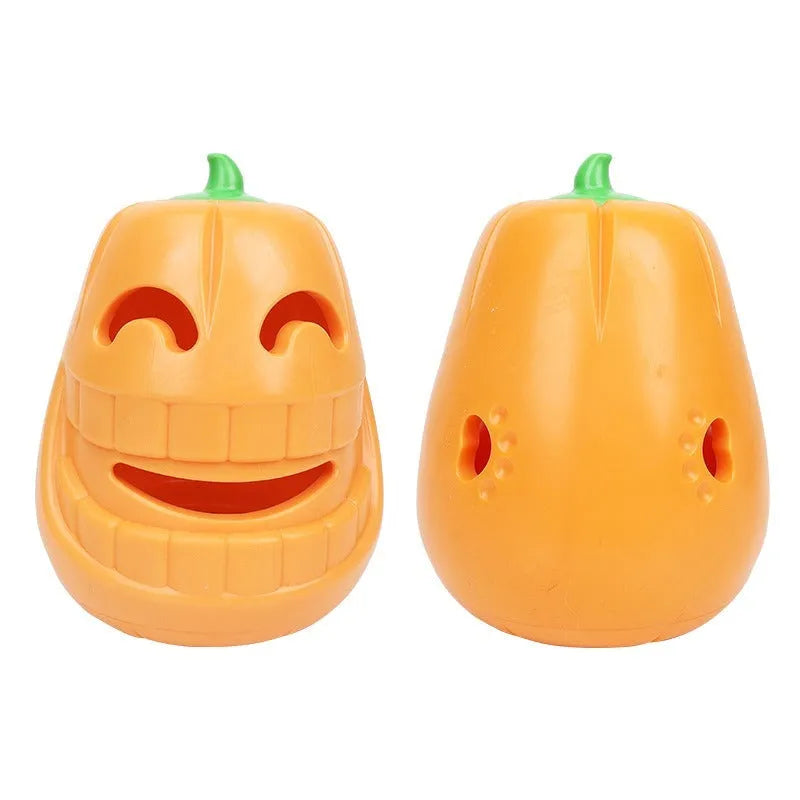 Orange Halloween pumpkin shaped dog chew toy with a treat-dispensing funnel hole