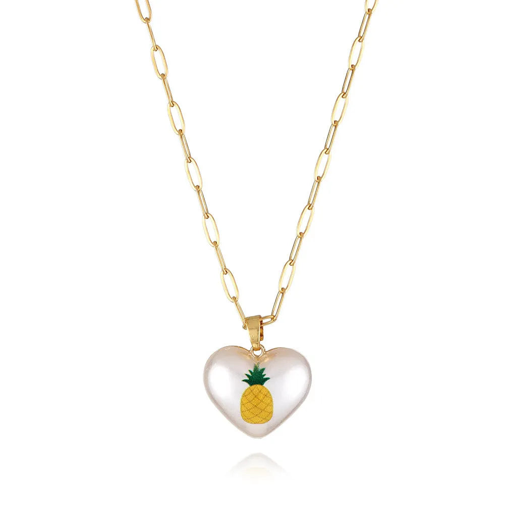 Geometric fruit pendant necklace with adjustable chain showing apple, pineapple, strawberry, cherry and pear designs