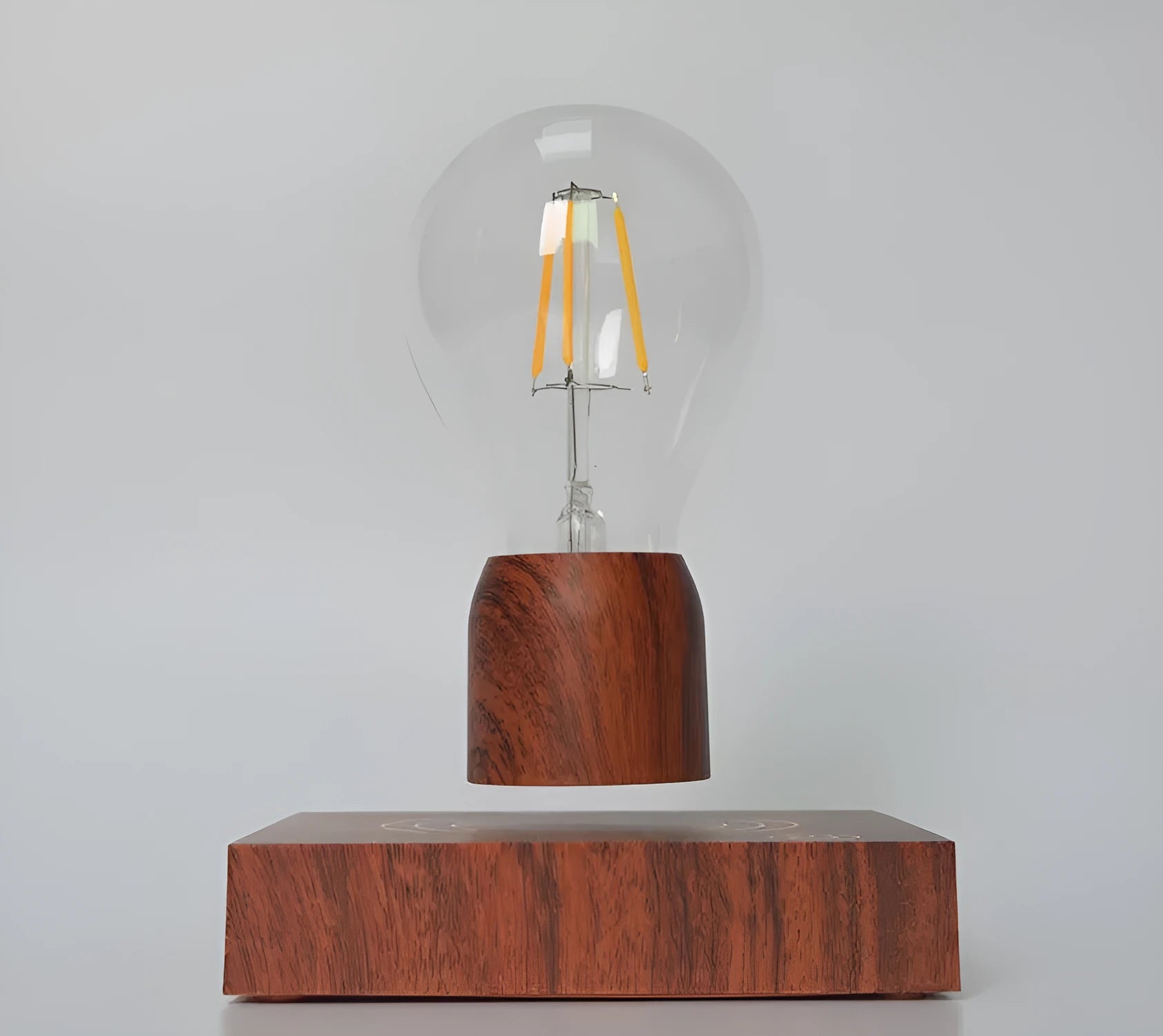 Magnetic levitation floating light bulb on imitation wood base