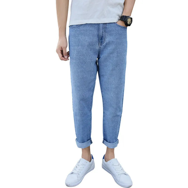 Men's straight-leg harem jeans in black or blue cotton fabric showing loose fit design