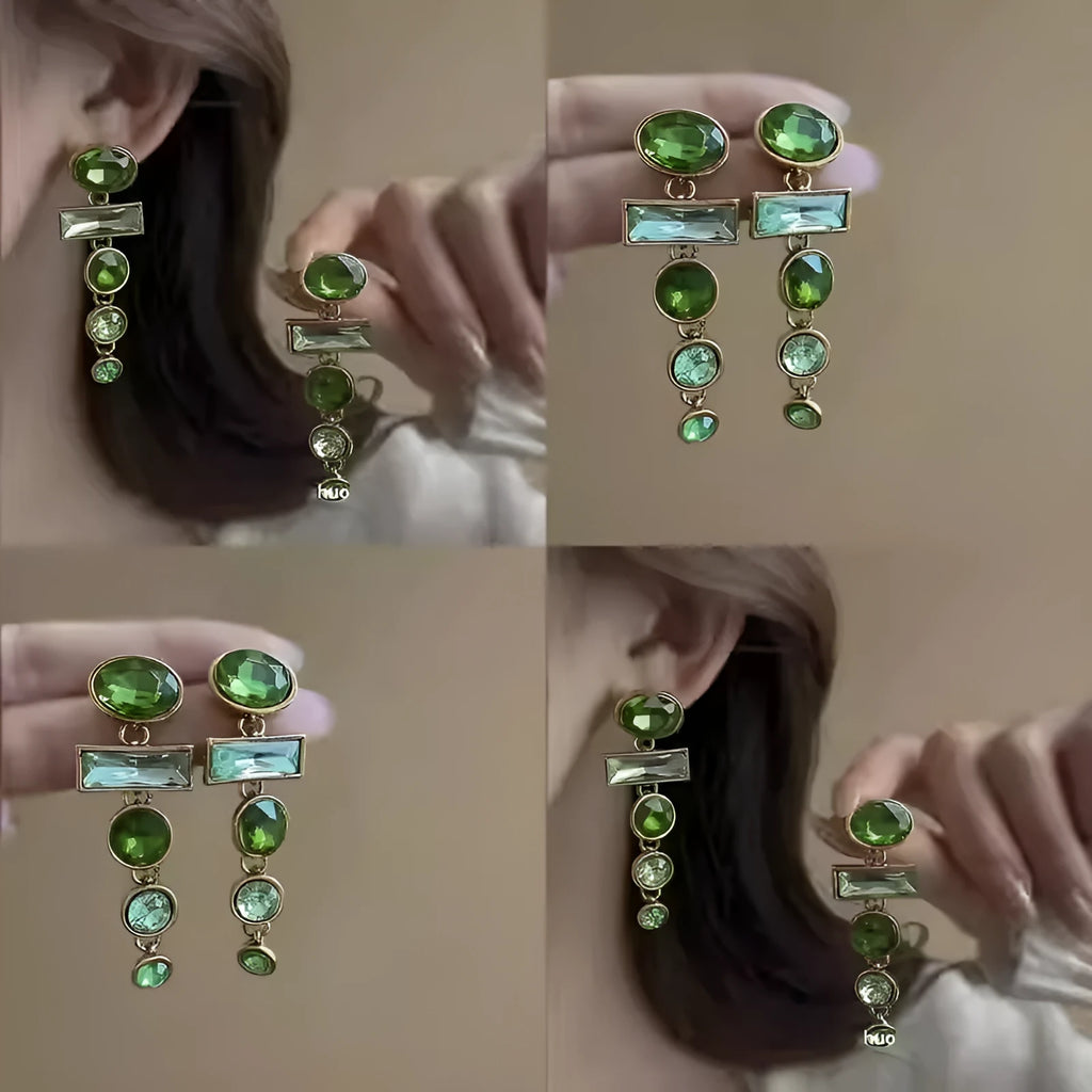 A pair of geometric Chinese style alloy earrings with a retro green gradient finish and zircon-inlaid tassels.