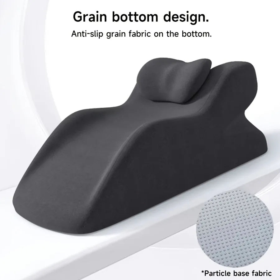 A stomach sleeper pillow designed for lying on your front, shown in blue, dark grey, green, and light grey colour options.
