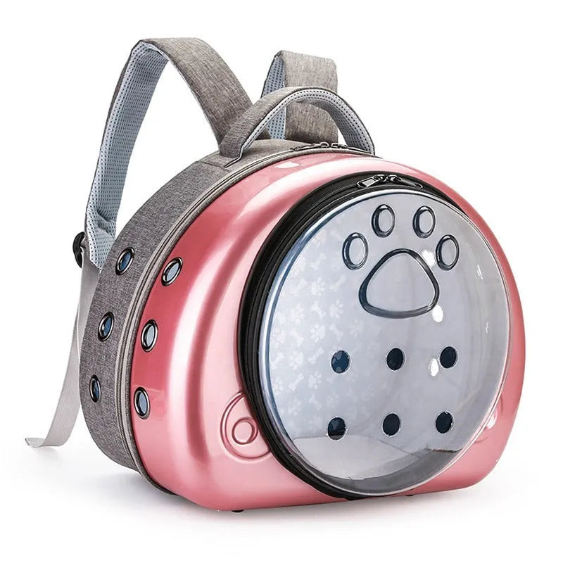 Transparent space capsule style cat carrier bag with breathable design and rose gold front cover.