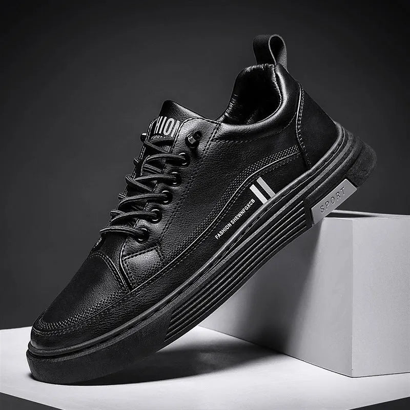 Men's white low-top skate shoes with a microfiber upper and elastic band, shown on a grey background.