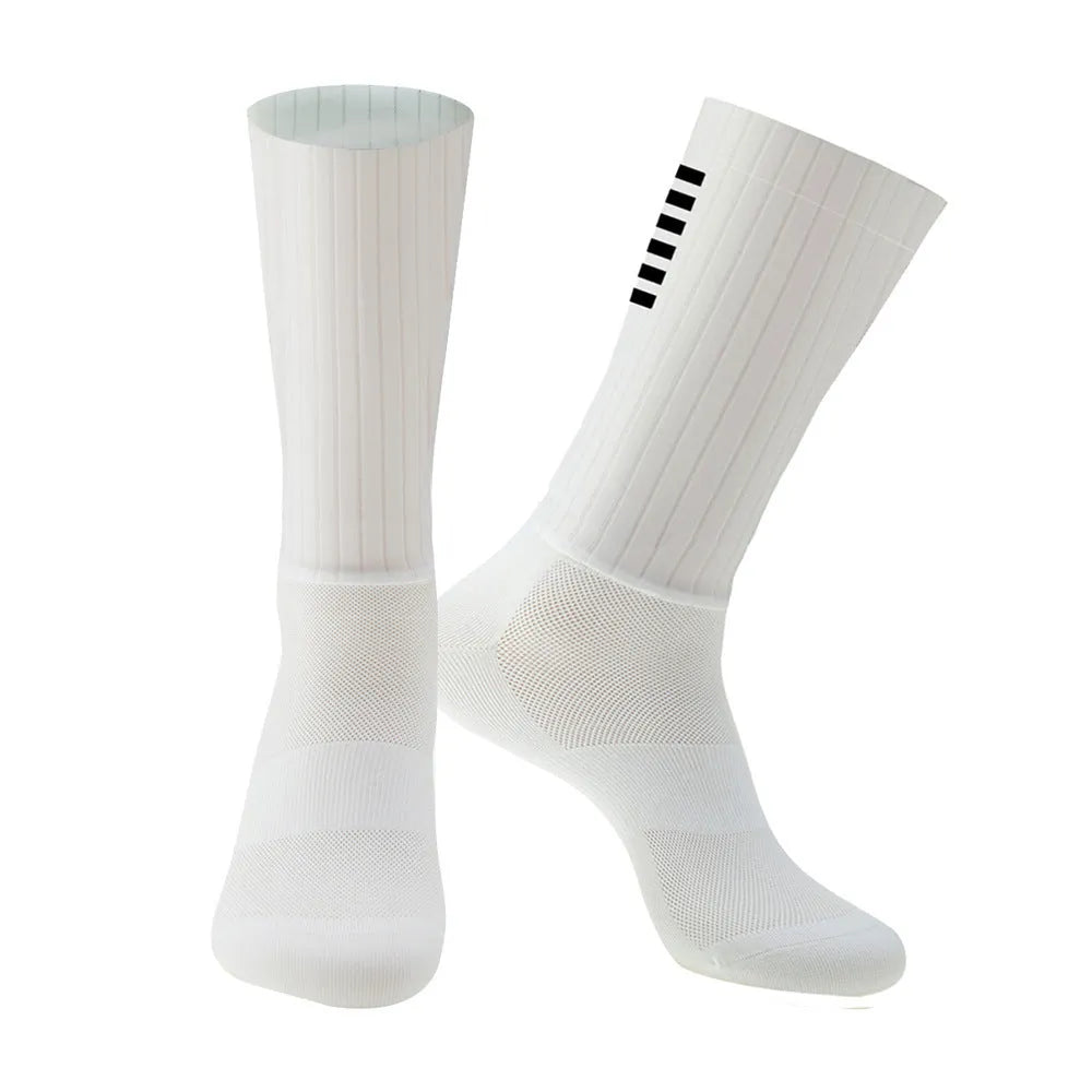 Cycling socks in chemical fibre blend fabric shown in orange, black, purple, white, grey and dark blue colour options