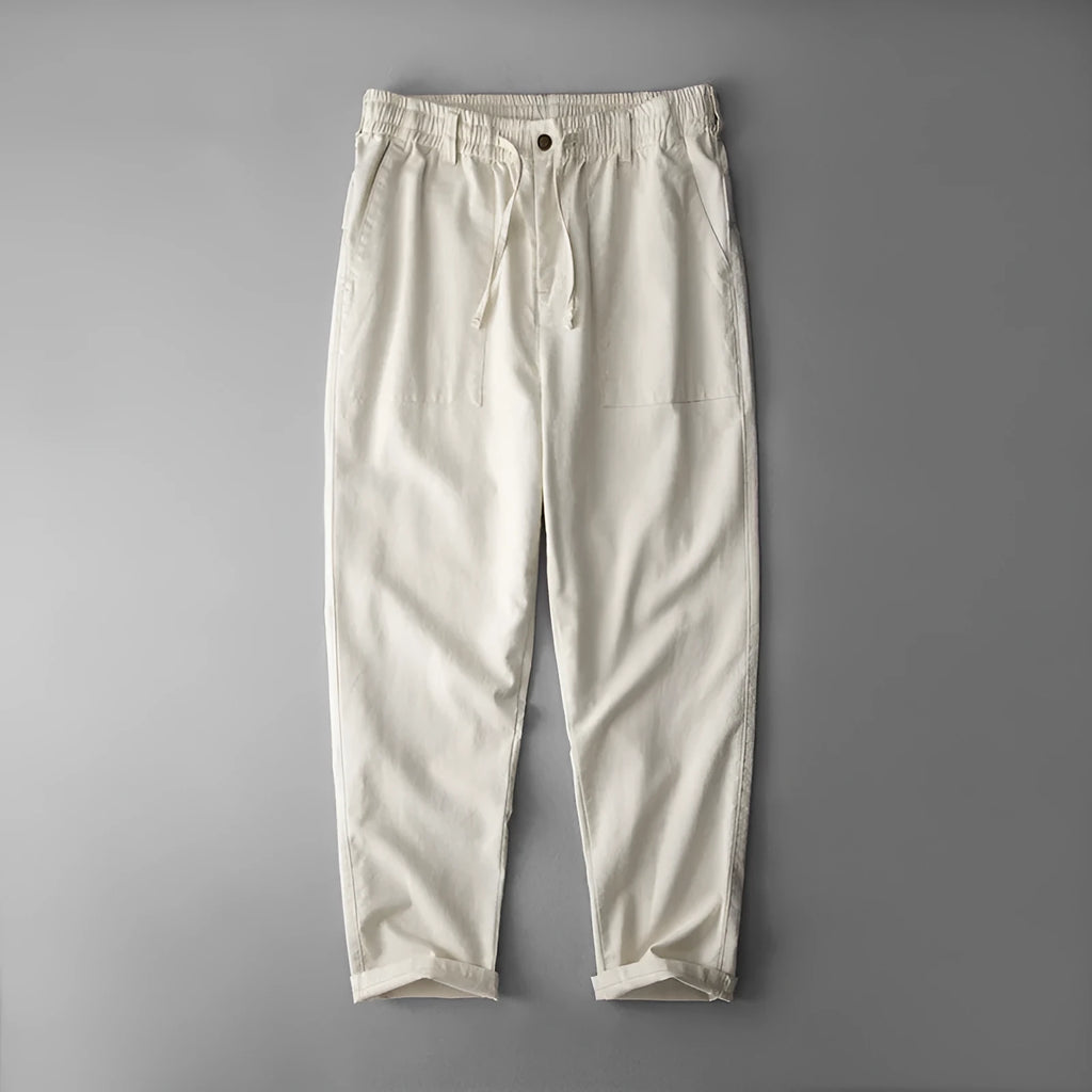 Men's solid colour linen casual trousers in navy blue, shown from the front.