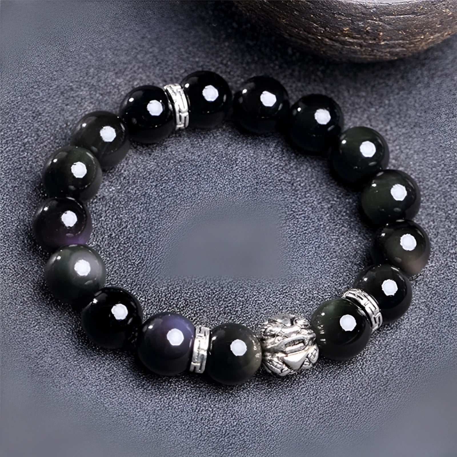 Obsidian bracelet with silver clasp showing male 12MM and female 10MM size options
