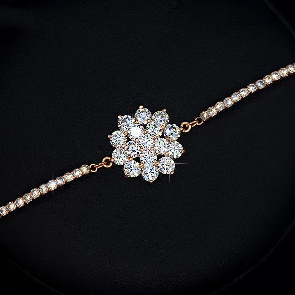 Rose gold cubic zirconia bracelet with cross crown Roman numeral motifs on alloy setting