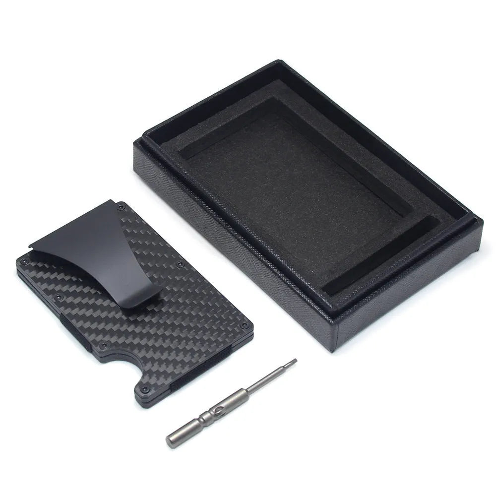 Geometric carbon fibre and aluminium slim card holder wallet in multiple colour options on a table.