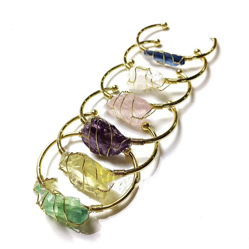 Natural rough crystal bracelet with gold wire winding in geometric bohemian design