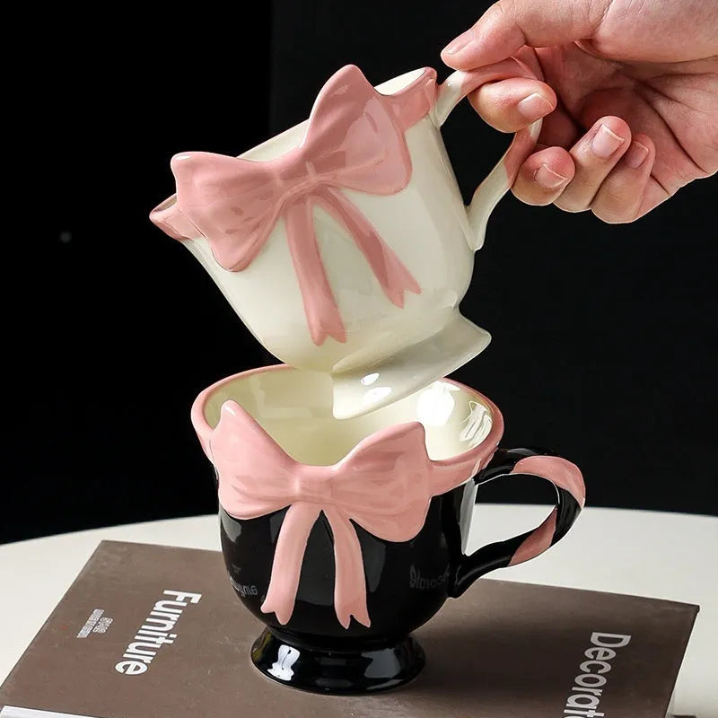 Ceramic mug with girl heart bow design in black pink colour