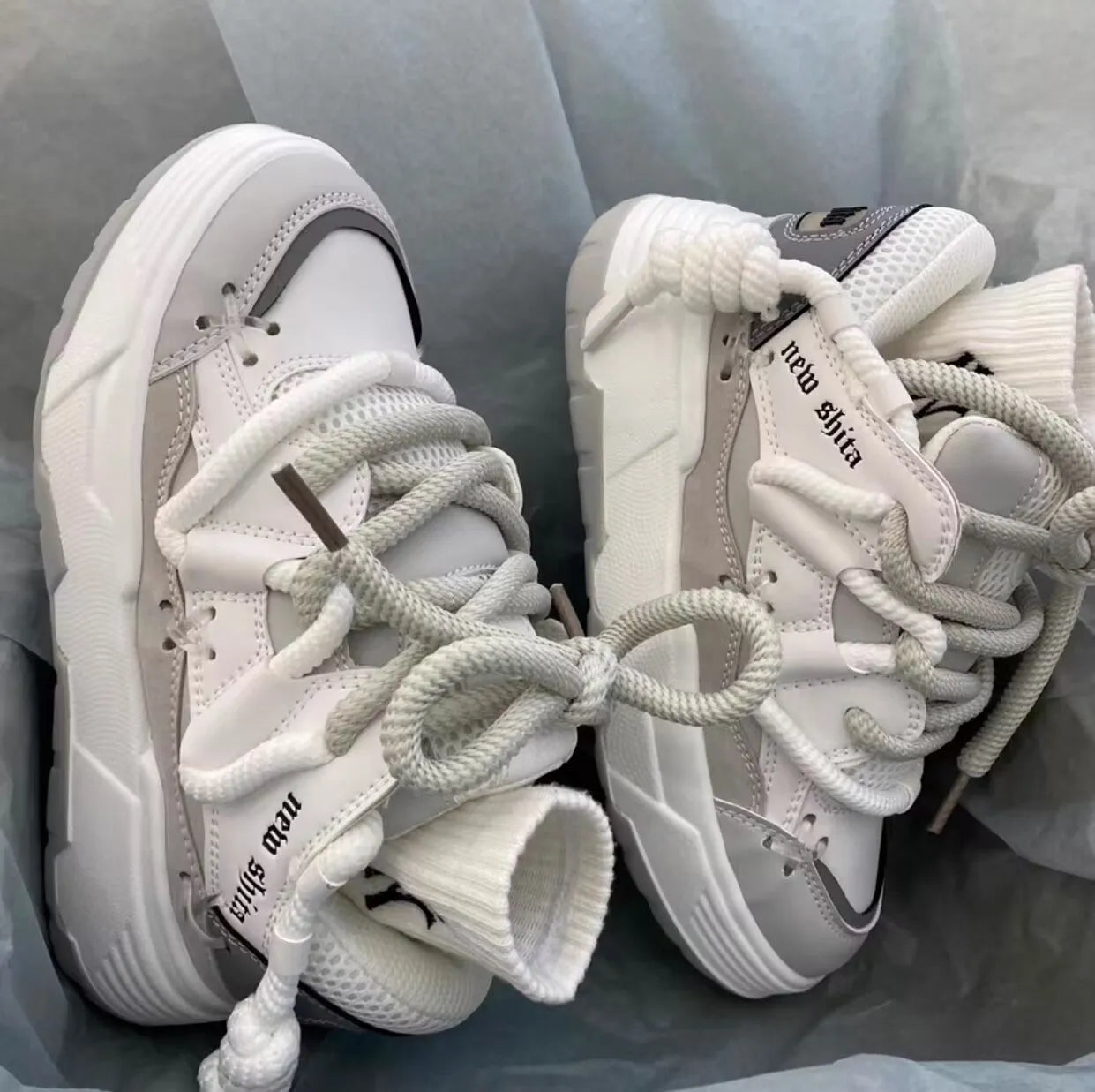 Women's grey thick sole retro sneakers with round toe and front tie-up fastening