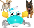 Blue automatic crab dog toy with obstacle avoidance sensor on a flat surface.