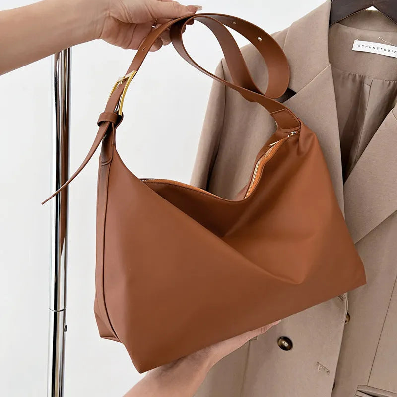 Large capacity simple PU tote bag in black, brown, or coffee colour with single shoulder strap and no lining