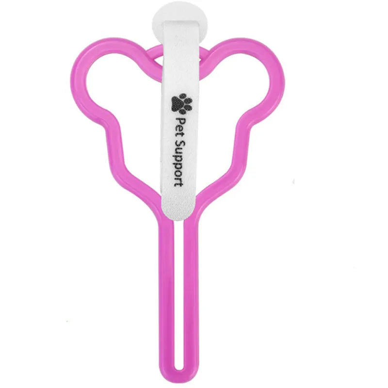 A coloured hands-free dog poop bag holder with a fixed clip and velcro strap attached to a dog leash.