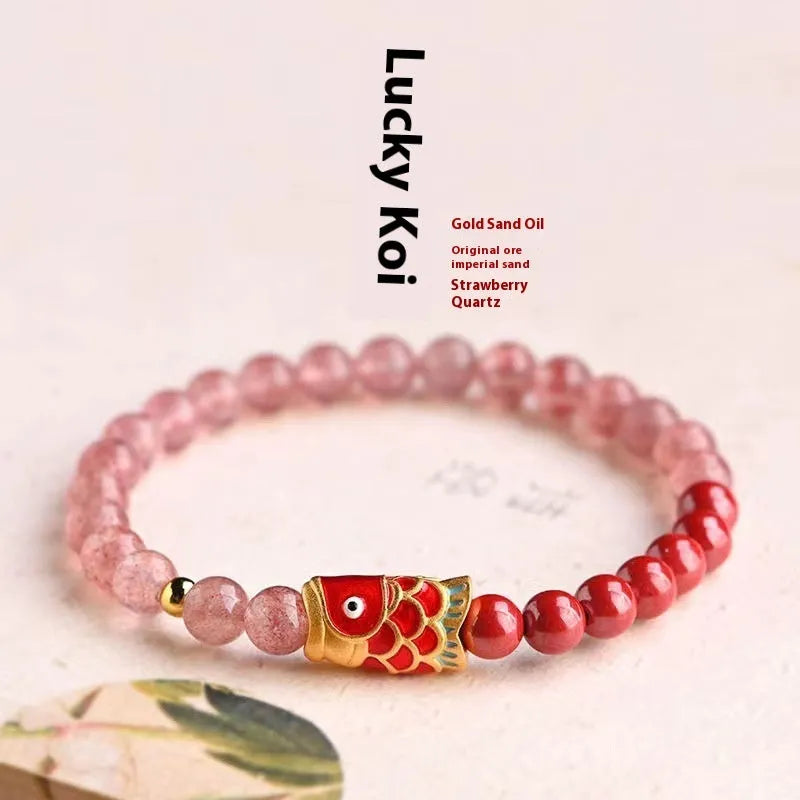 Close-up of a women's adjustable bracelet made with purple cinnabar and strawberry quartz beads in a retro style.