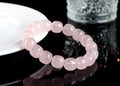 Pink crystal barrel bead bracelet with natural bamboo elements and geometric design