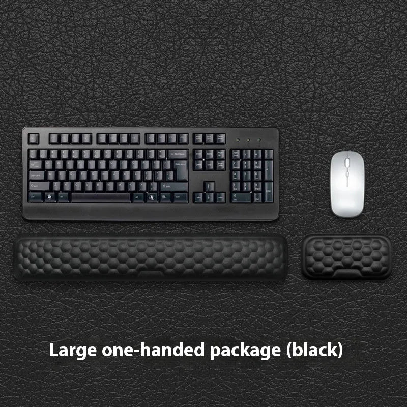 Memory foam mouse wrist rest with silicone base in black cloth and grey leather style options.